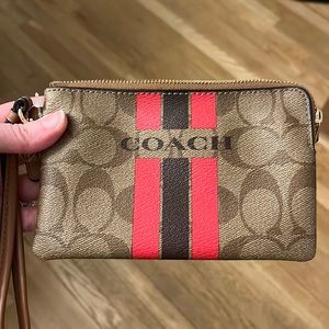 Brand new Coach wristlet. Never used